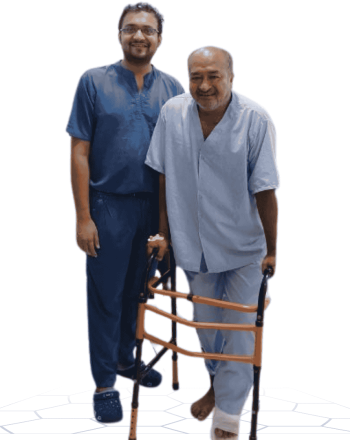 Dr. Shrenuj with patient -Knee Replacement Recovery